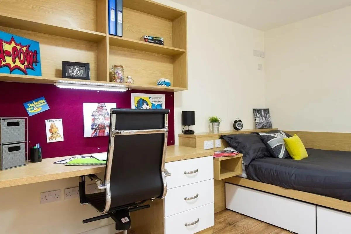 Desk bed storage and chair study area bedroom at Quebec House in Kingston Upon Thames Student Accommodation