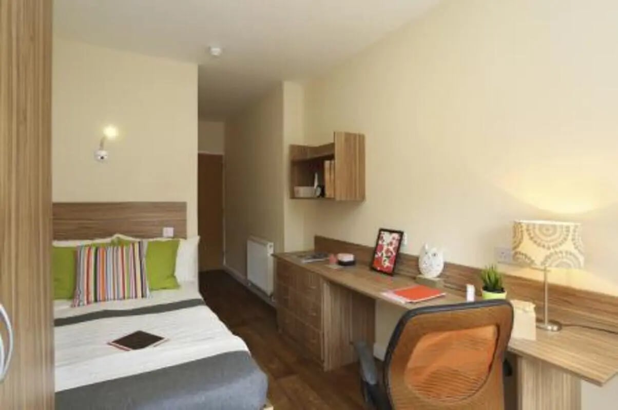 Bed desk with lamp and chair bedroom at Trinity Hall in Chester Student Accommodation