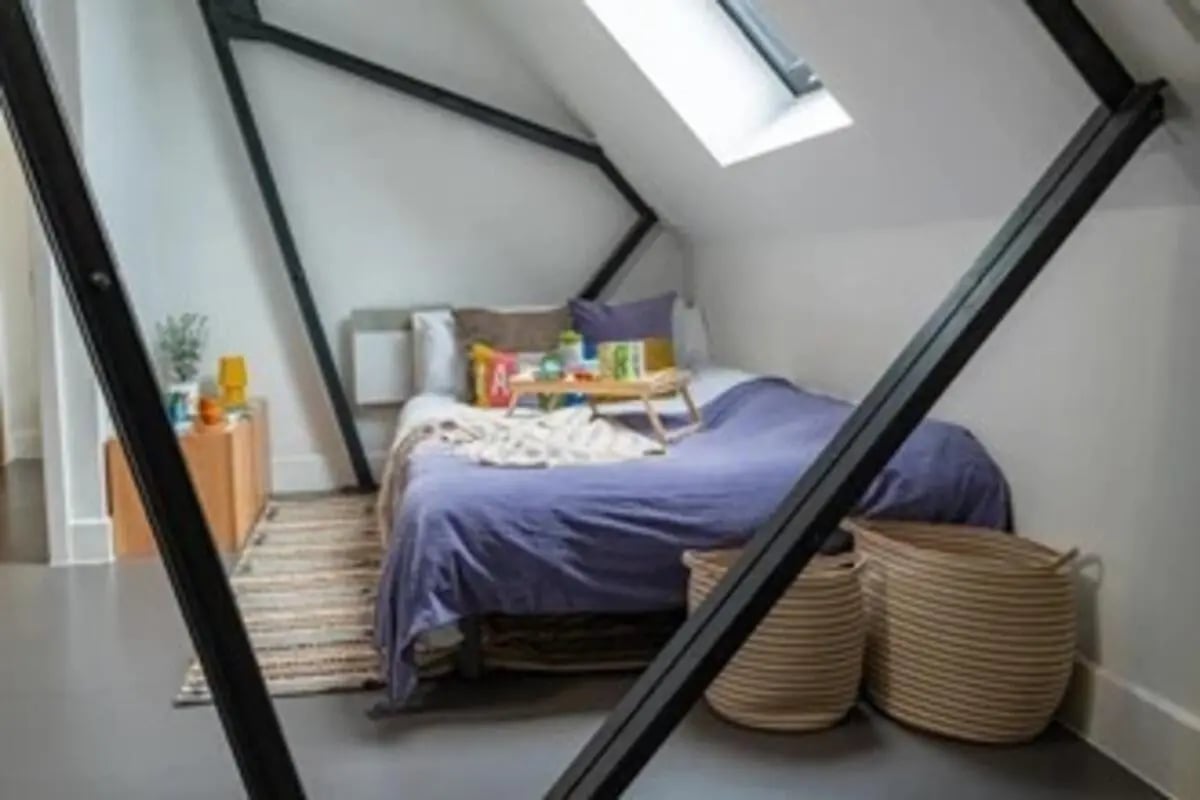 Bed with purple duvet and tray breakfast bedroom at The Old Fire Station - Birmingham in Birmingham Student Accommodation