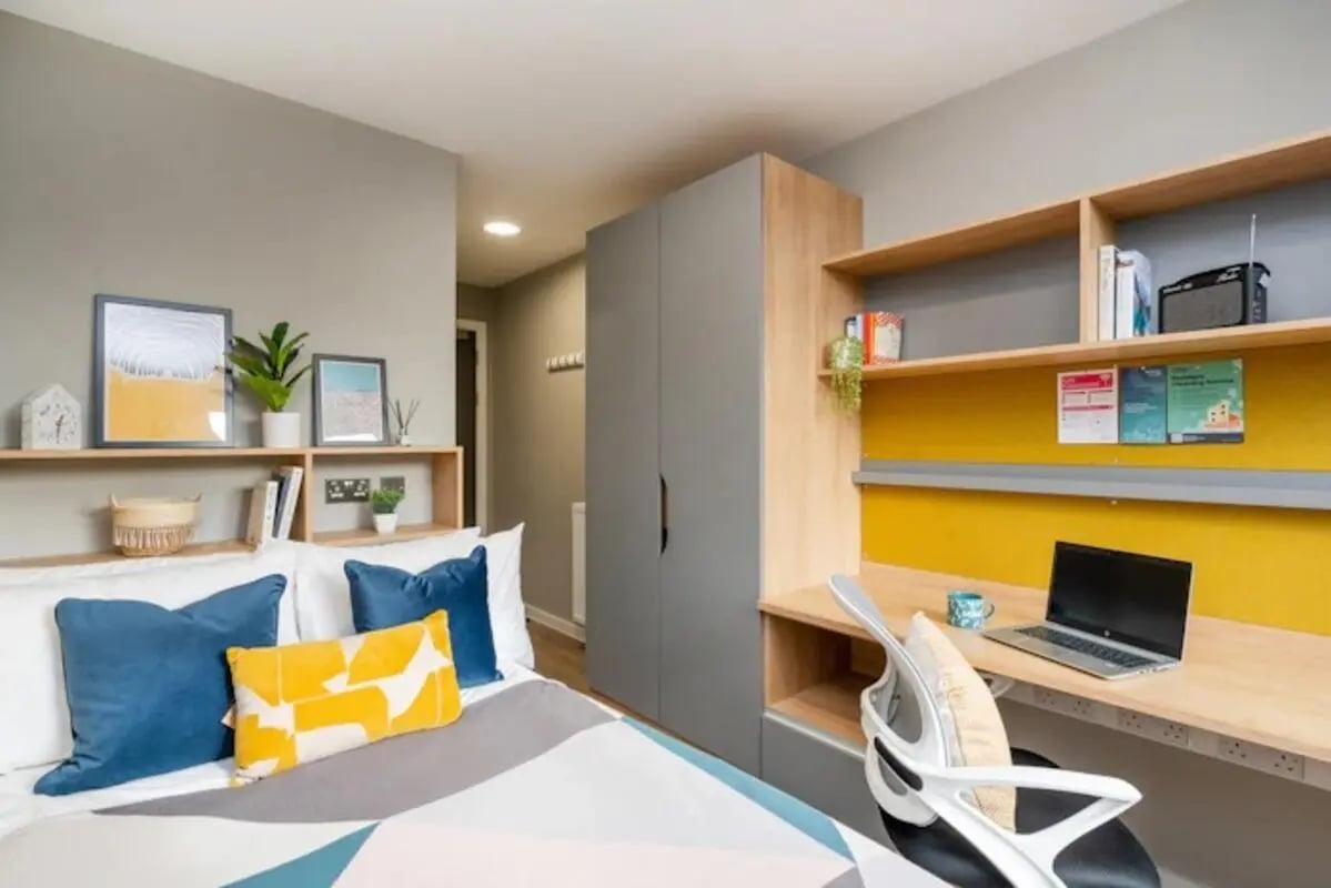 Bed study area with laptop and desk Bedroom at Zinc Quarter in Bristol Student Accommodation