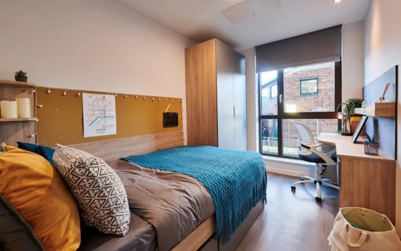 Bed desk closet with window bedroom at York House in Nottingham Student Accommodation