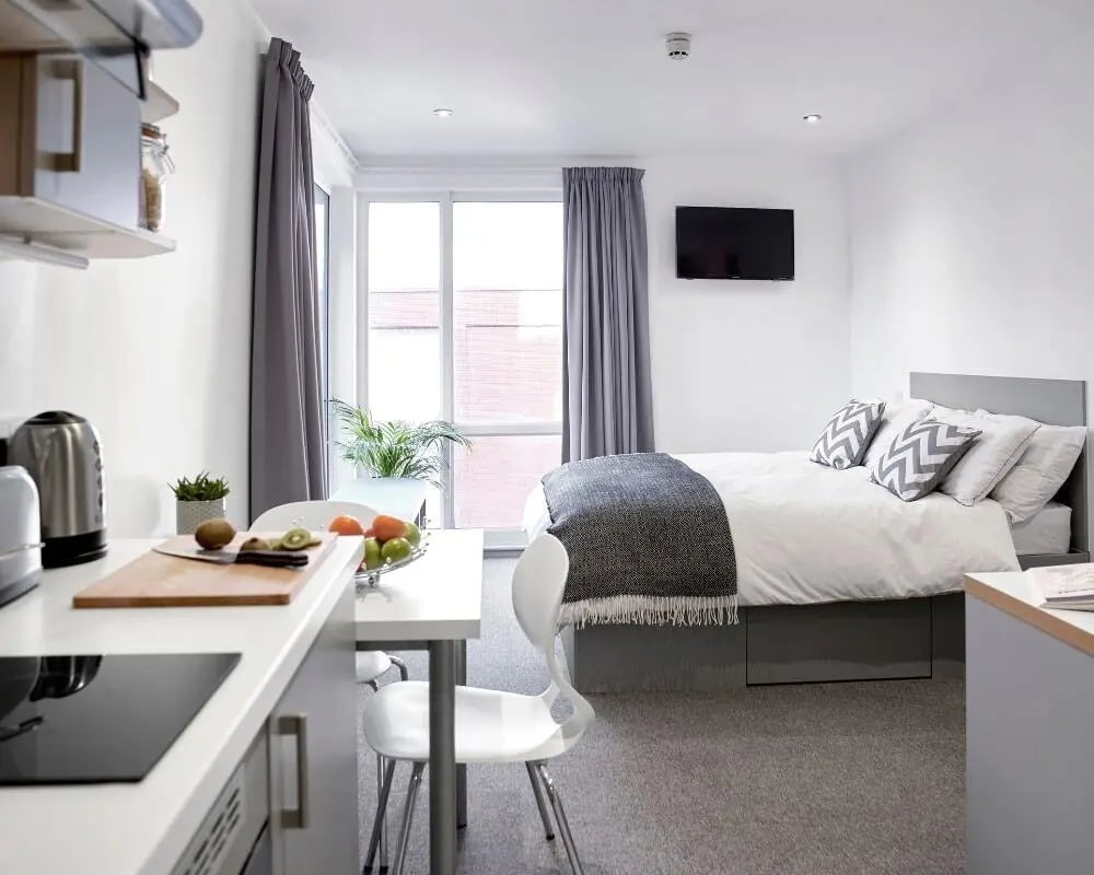Bed kitchen counter and fruit bowl studio apartment at Lace Market Studios in Nottingham Student Accommodation