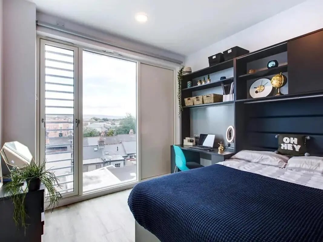 Bed desk shelves and window view bedroom at The Tannery in Dublin Student Accommodation