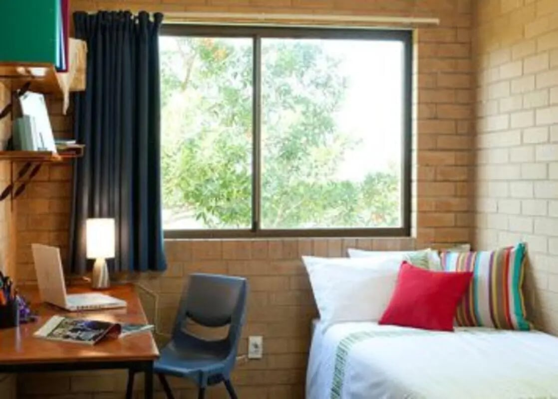 Desk bed chair and window bedroom at Unilodge SCU Lismore Orion in Lismore Student Accommodation