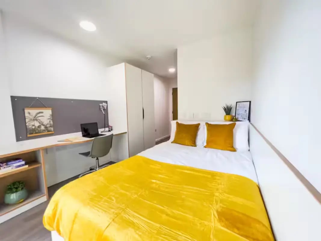 Bed desk laptop chair and shelves bedroom at Dobbie's Point in Glasgow Student Accommodation