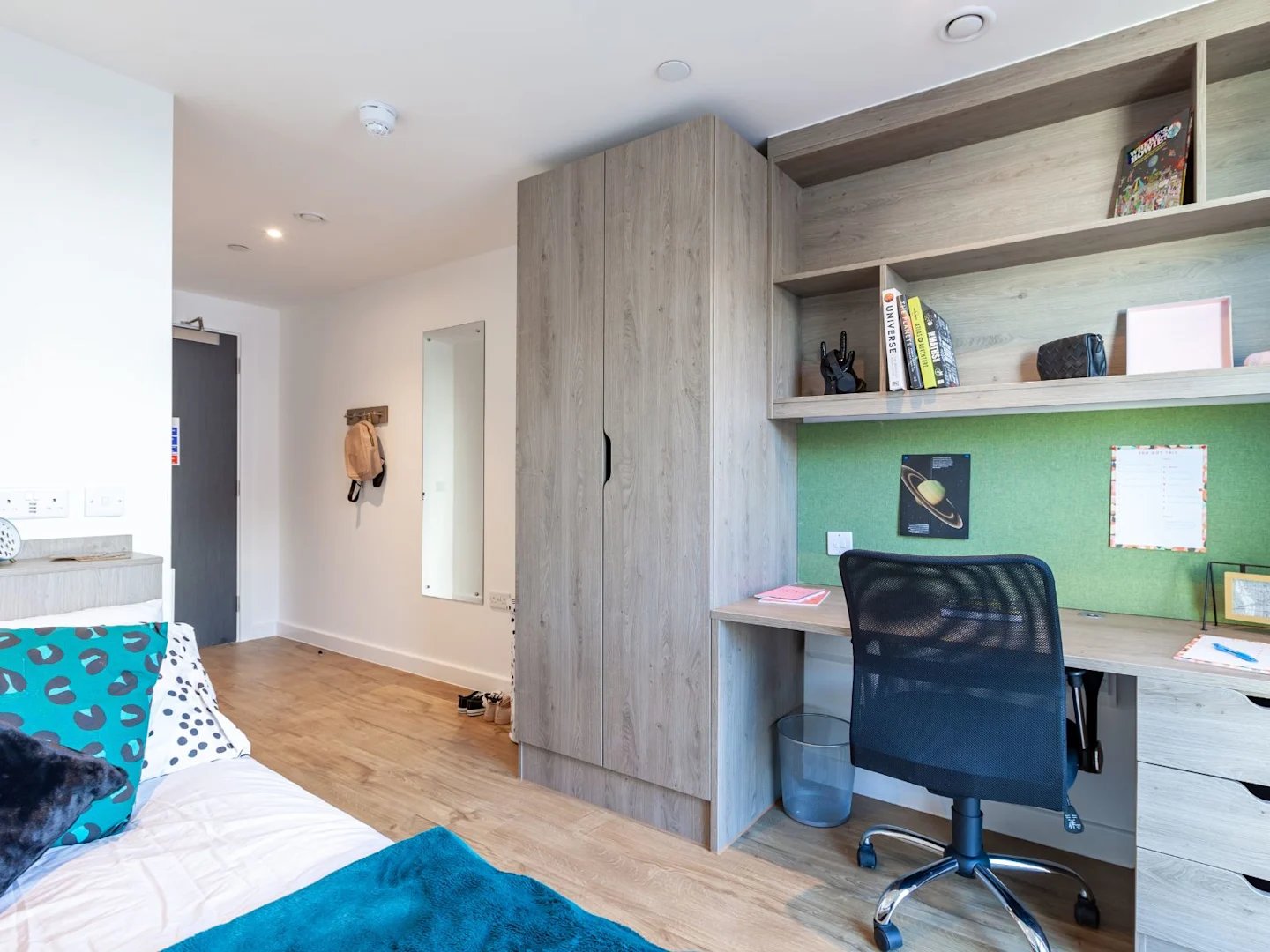 Bed desk chair wardrobe mirror study area at Pavilion Point in Brighton Student Accommodation