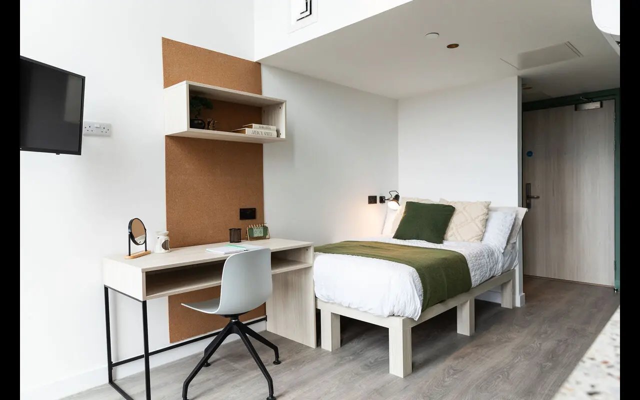 Bed desk chair and television bedroom at Martha Street Apartments in Glasgow Student Accommodation