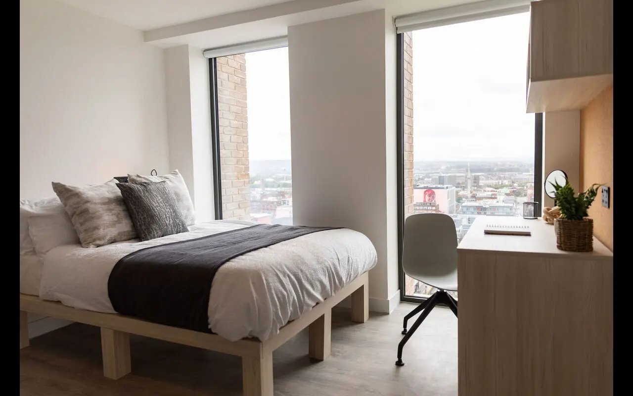 Bed with desk and chair bedroom at Martha Street Apartments in Glasgow Student Accommodation
