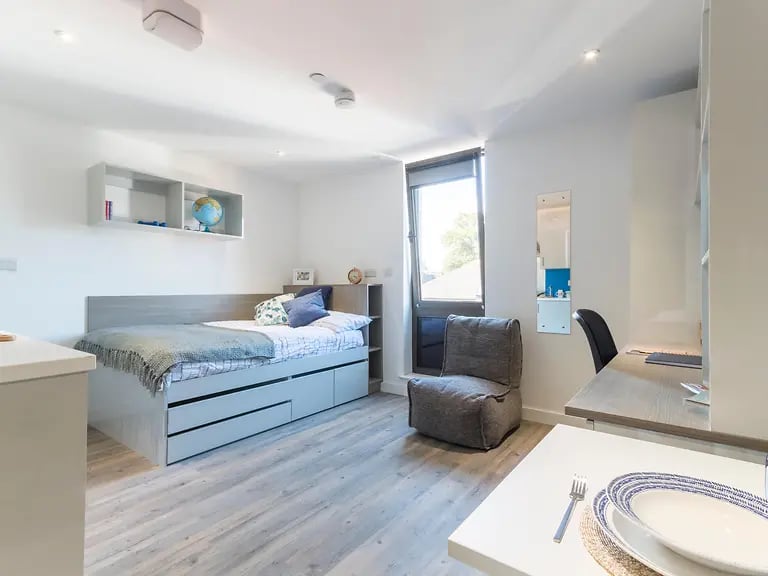 Bed desk chair beanbag shelving Globe bedroom at Glendower House in Cardiff Student Accommodation