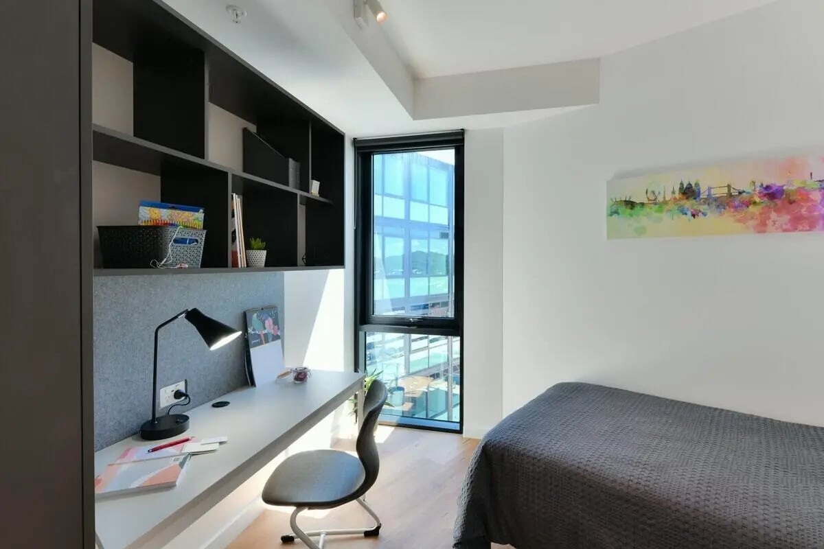 Desk lamp bed and artwork bedroom study area at UniLodge Toowong in Brisbane Student Accommodation