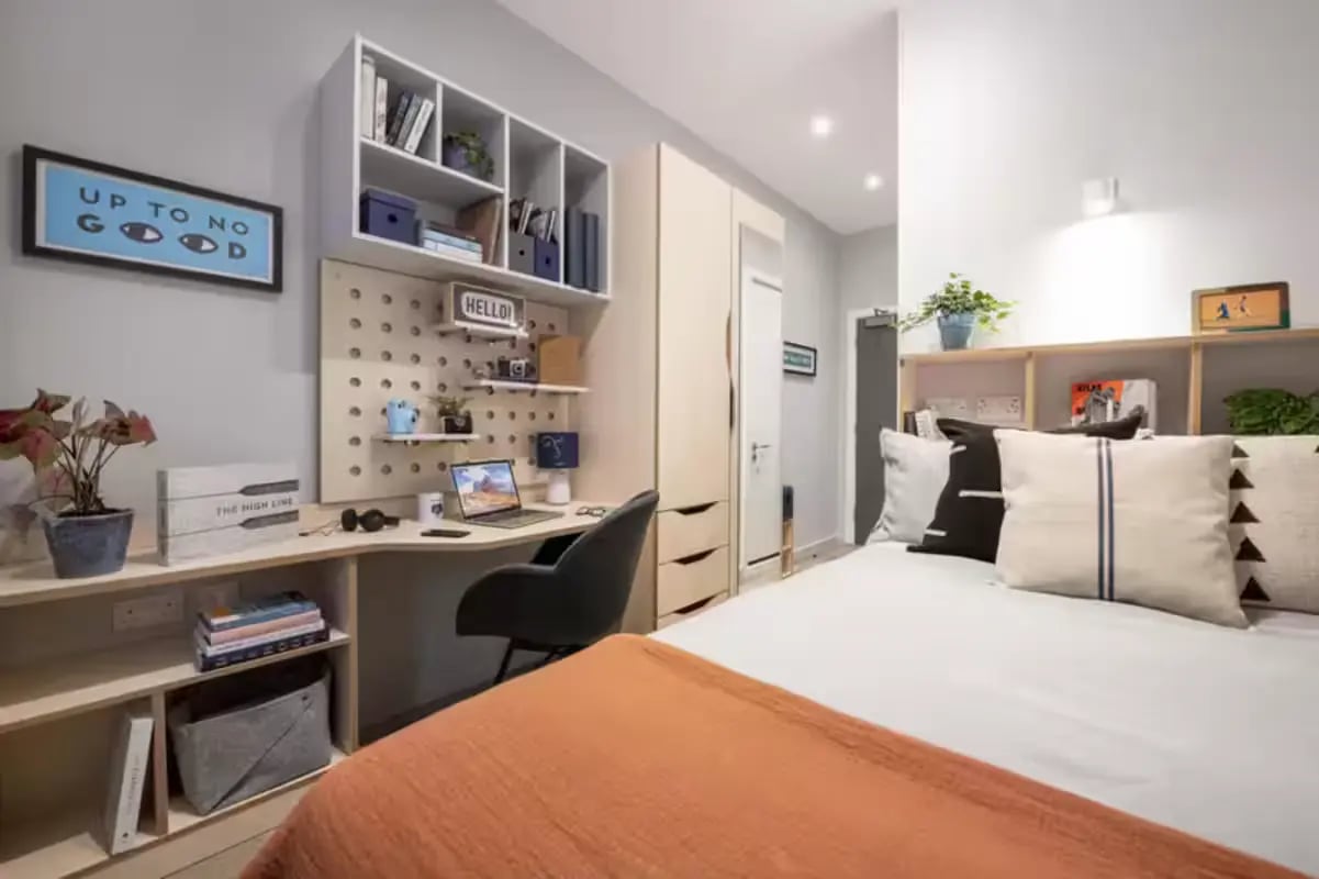 Desk bed wardrobe and shelves bedroom at Hillside House Sheffield in Sheffield Student Accommodation