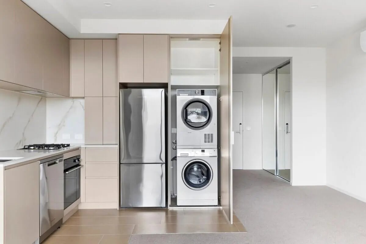 Kitchen with appliances and laundry area kitchen at Realm Caulfield in Melbourne Student Accommodation