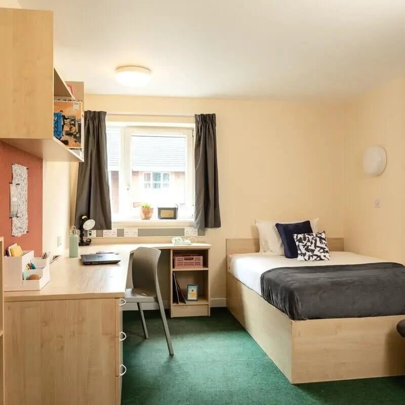 Bed desk chair shelves window Bedroom at Belgrave View in Birmingham Student Accommodation