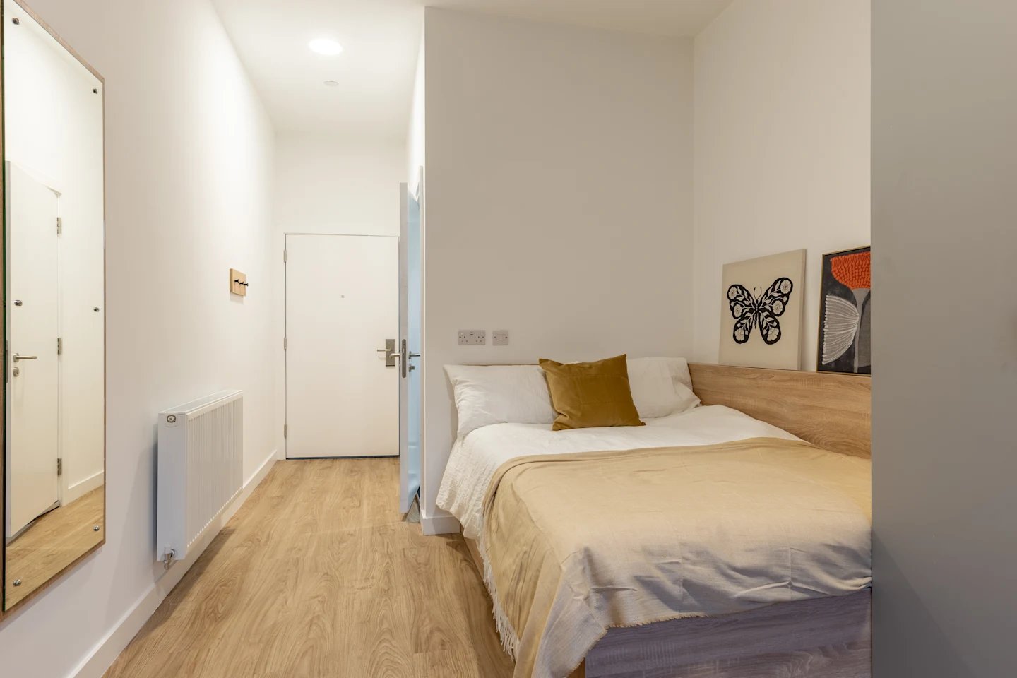 Bed radiator mirror door artwork Bedroom at Beckton House in Nottingham Student Accommodation