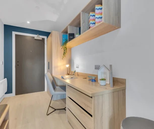 Desk chair wardrobe and shelves study area at Iconinc The Bonnie in Glasgow Student Accommodation