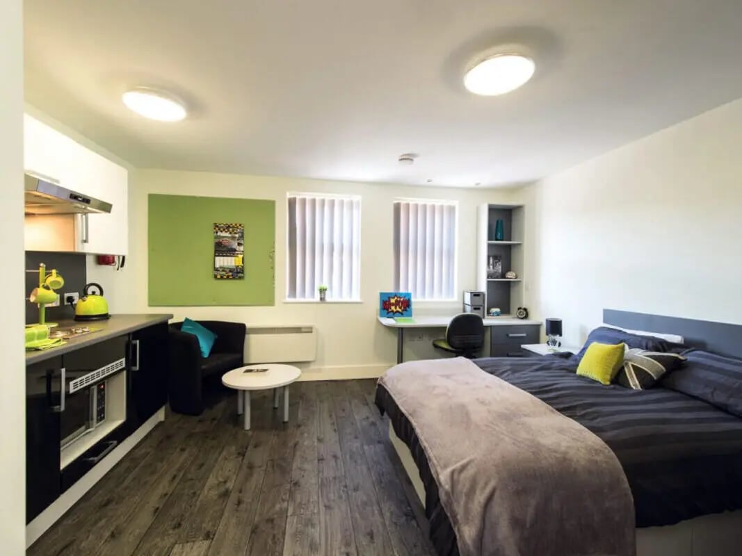 Kitchen study area bed living room studio at Ty Ni in Bangor Student Accommodation