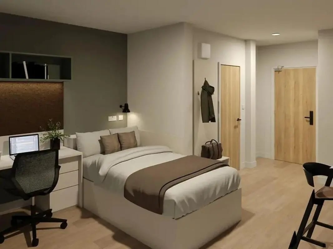 Bed desk chair doors coat bag Bedroom at Yugo Haüs in Birmingham Student Accommodation