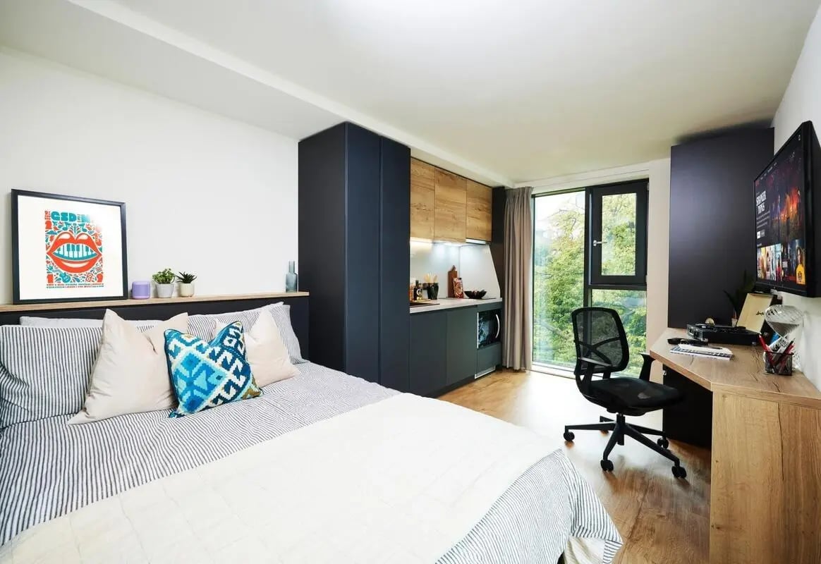 Bed kitchen desk and TV student studio at Vita Student Park Place in Cardiff Student Accommodation