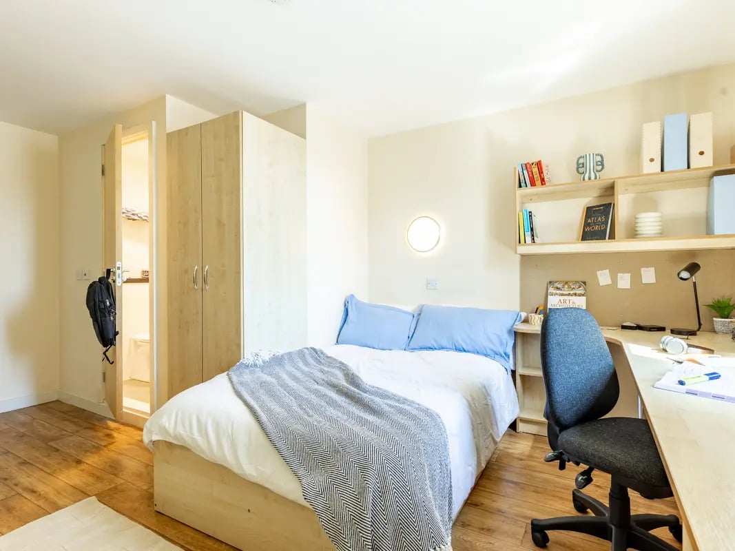 Bed desk closet backpack and shelves bedroom at Europa in Liverpool Student Accommodation