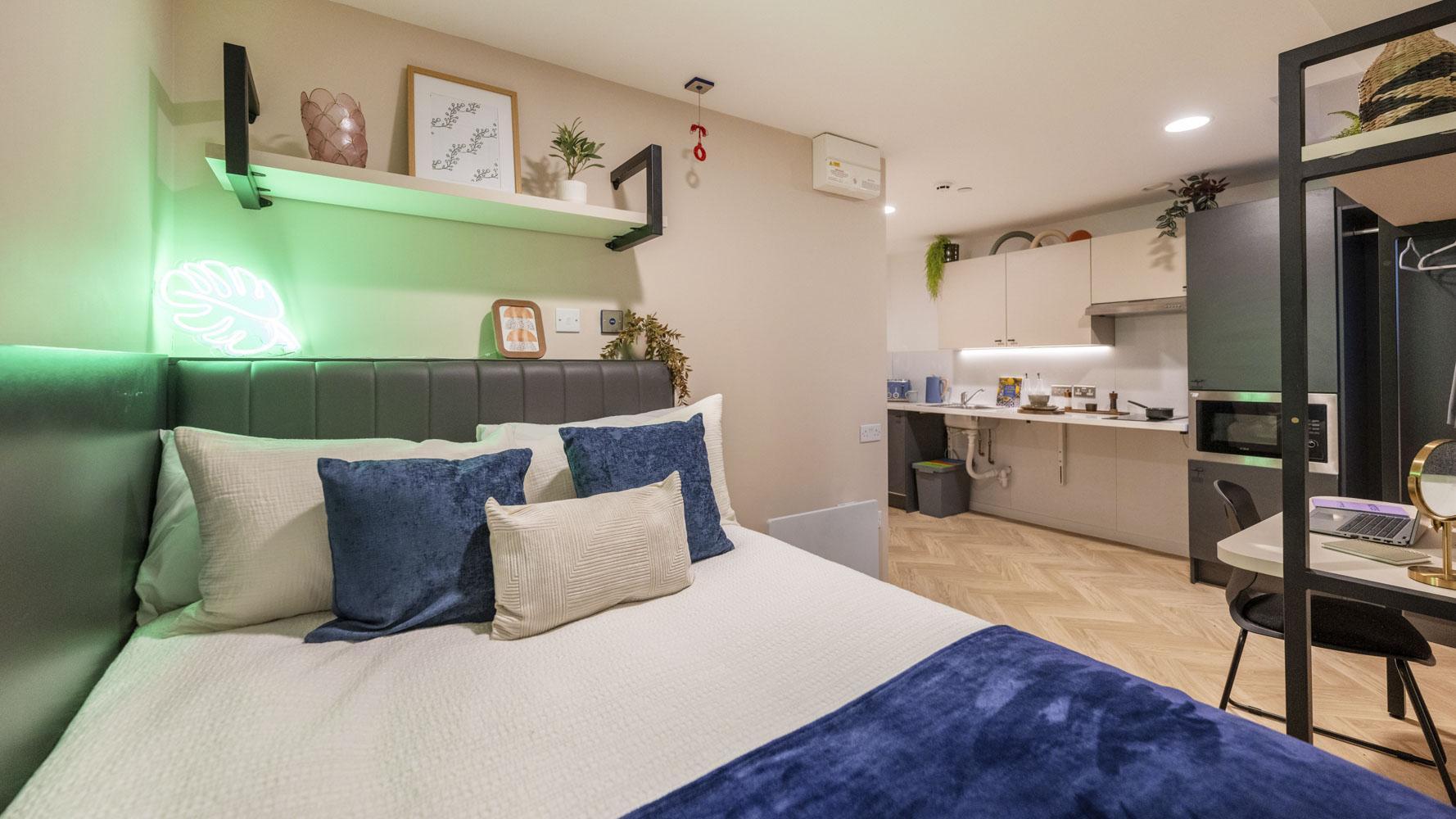 Bed kitchen and desk studio bedroom at Arcadian in Nottingham Student Accommodation