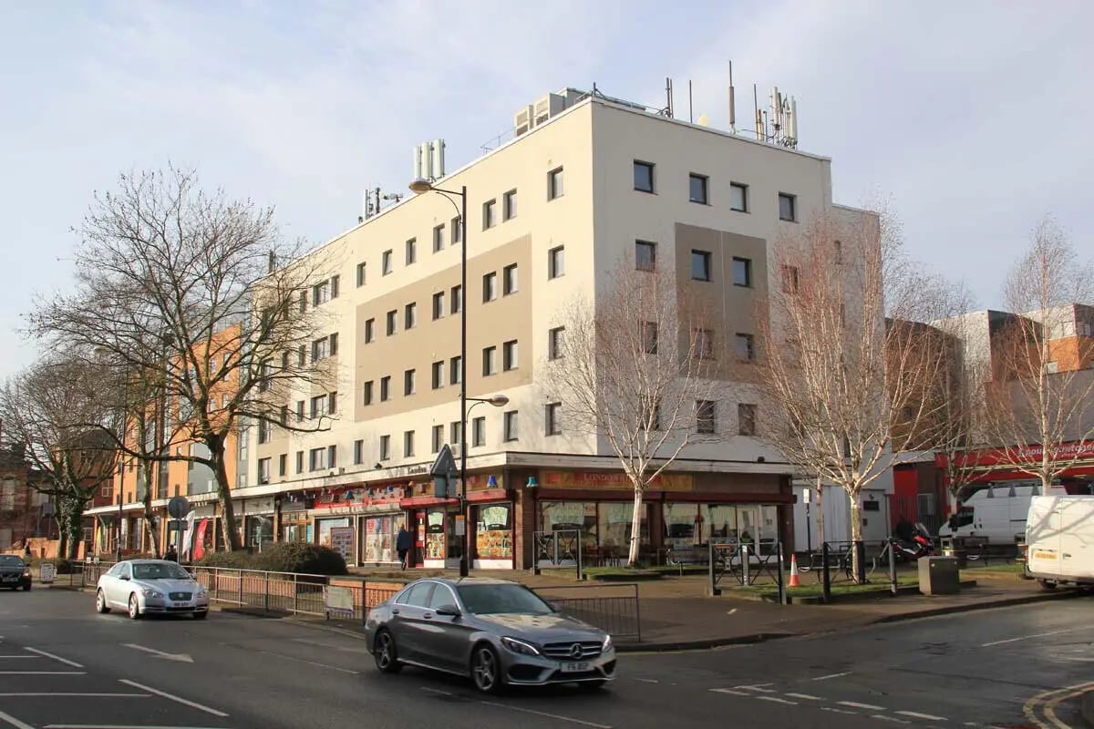 Modern building with shops below exterior at Stoke Student Village in Stoke-On-Trent Student Accommodation
