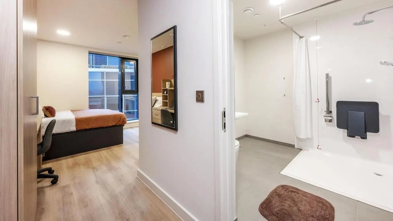 Bed desk and shower in studio apartment at Haymarket Yards in Edinburgh Student Accommodation