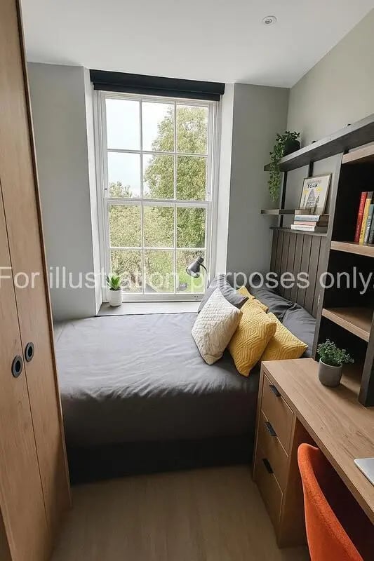 Bed desk lamp shelves and pillows bedroom at The Port On The Square in Bristol Student Accommodation
