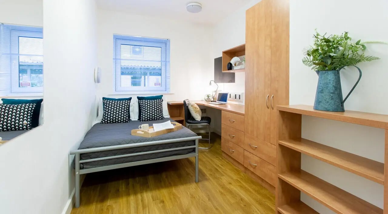 Bed desk and wardrobe bedroom at Exeter One in Exeter Student Accommodation