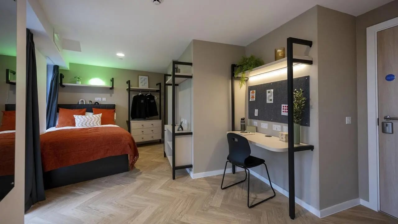 Bed desk wardrobe and shelves bedroom at Arcadian in Nottingham Student Accommodation