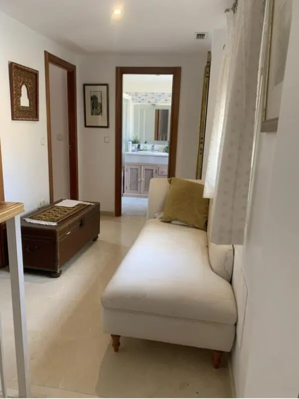 Double bedroom with private bathroom and views of the pool