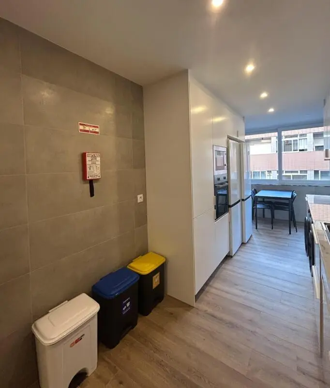 Bright bedroom in a 6-bedroom flat