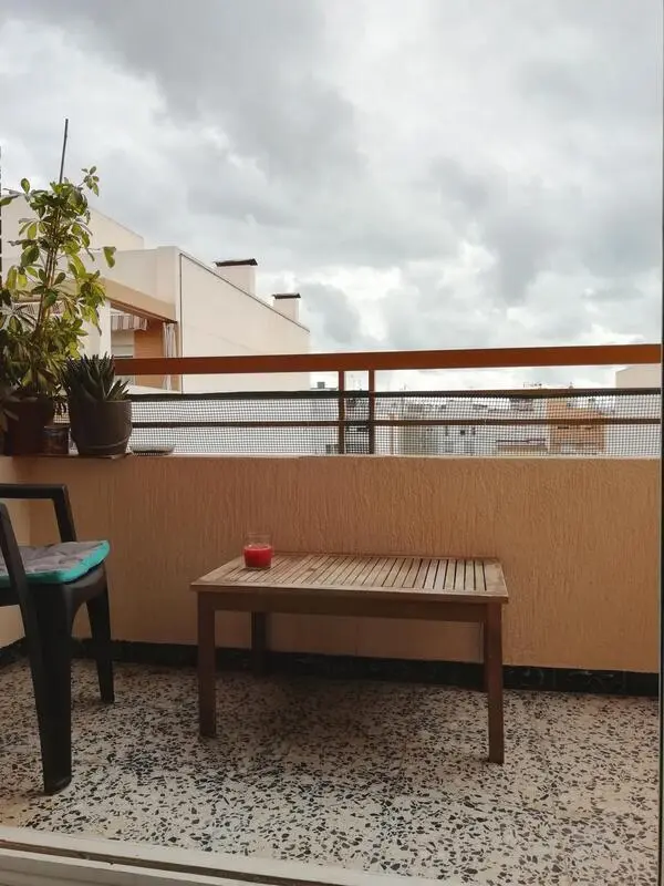 Single bedroom with desk and TV