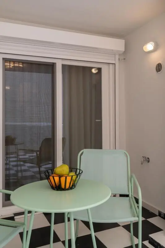 Color Bliss Pagrati 1 bedroom patio apartment in the heart of the city
